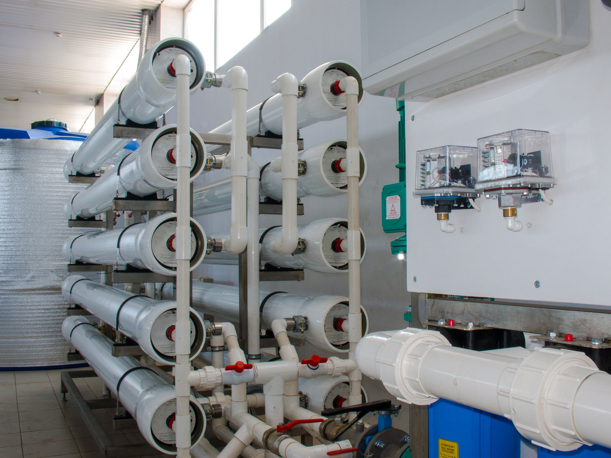 Reverse osmosis system - installation of industrial membrane devices to the purification of drinking water: pumps, pipelines, tanks, etc.